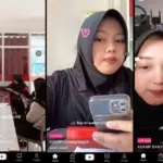 Pegawai Koperasi Desa sedang melakukan siaran langsung di TikTok menggunakan smartphone saat kondisi toko sepi pembeli.